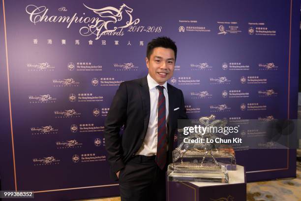 Owner of Beauty Generation, Mr. Patrick Kwok Ho Chuen receives the Champion Miler trophy at 2017/18 HKJC Champion Awards Presentation Ceremony on...