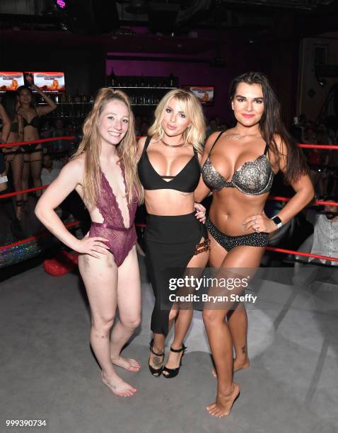 Model Jessica Weaver appears with contestants of "Foxy Boxing" as she hosts Larry Flynt's Hustler Club Instagram party at Larry Flynt's Hustler Club...