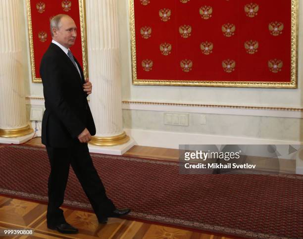 Russian President Vladimir Putin enters the hall during the ceremony at the Kremlin, in Moscow, Russia, July 2018. Qatar is hosting FIFA World Cup in...