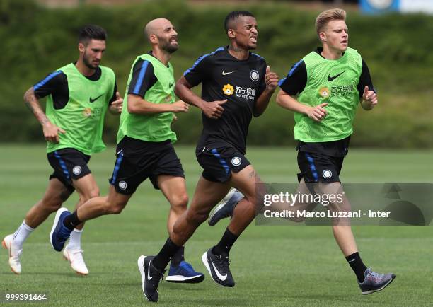 Matteo Politano, Borja Valero, Henrique Dalbert and Maj Roric of FC Internazionale run during the FC Internazionale training session at the club's...