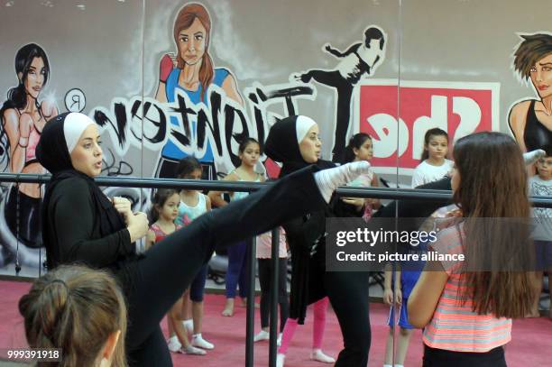 Ines Khalifeh giving a self-defence course for girls between 5 and 13 years of age in the "SheFighter" self-defence centre for women in Amman,...