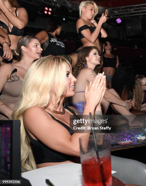 Model Jessica Weaver judges contestants competing in "Foxy Boxing" as she hosts Larry Flynt's Hustler Club Instagram party at Larry Flynt's Hustler...