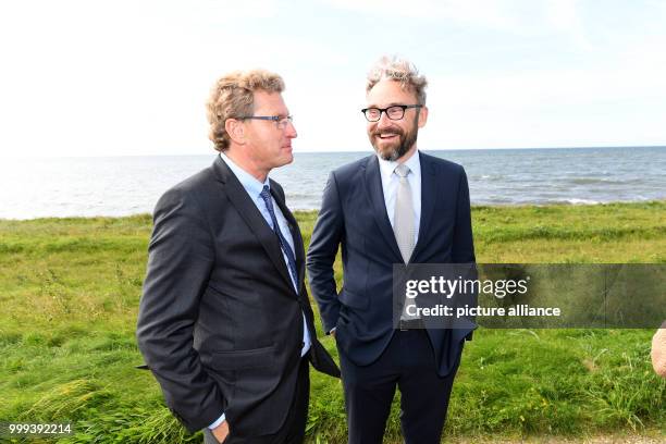 The Economy Minister of the state of Schleswig-Holstein, Bernd Buchholz , speaking with his Danish counterpart Ole Birk Olesen in Rødbyhavn, Denmark,...