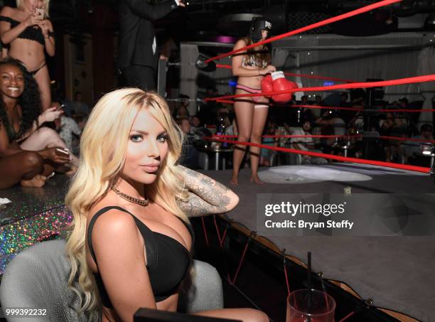 Model Jessica Weaver judges contestants competing in "Foxy Boxing" as she hosts Larry Flynt's Hustler Club Instagram party at Larry Flynt's Hustler...