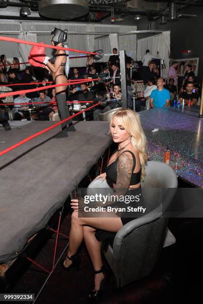 Model Jessica Weaver judges contestants competing in "Foxy Boxing" as she hosts Larry Flynt's Hustler Club Instagram party at Larry Flynt's Hustler...