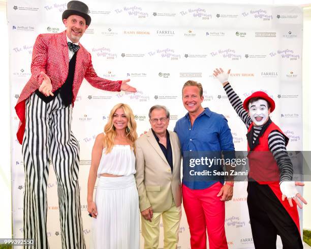 Ramy Brook Sharp, Samuel Waxman M.D. And Chris Wragge attend The Samuel Waxman Cancer Research Foundation 14th Annual The Hamptons Happening on July...