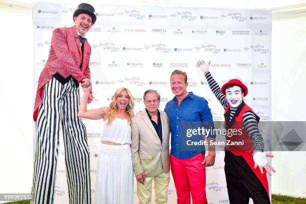 Ramy Brook Sharp, Samuel Waxman M.D. And Chris Wragge attend The Samuel Waxman Cancer Research Foundation 14th Annual The Hamptons Happening on July...