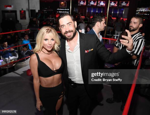 Model Jessica Weaver and Larry Flynt's Hustler Club General Manager Ralph James attend Larry Flynt's Hustler Club Instagram party at Larry Flynt's...