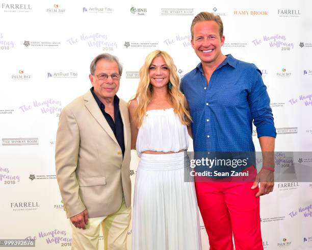 Samuel Waxman M.D., Ramy Brook Sharp and Chris Wragge attend The Samuel Waxman Cancer Research Foundation 14th Annual The Hamptons Happening on July...