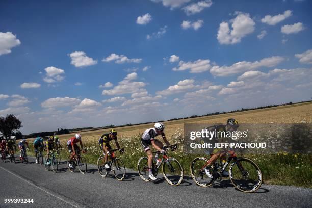 France's Jerome Cousin leads a ten-men breakaway during the ninth stage of the 105th edition of the Tour de France cycling race between Arras and...