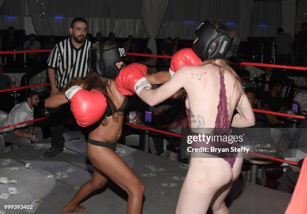 Contestants compete in "Foxy Boxing" during Larry Flynt's Hustler Club Instagram party hosted by Jessica Weaver at Larry Flynt's Hustler Club on July...