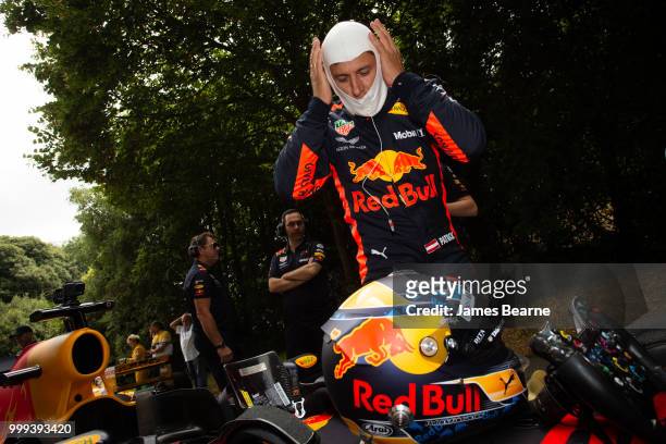 Patrick Friesacher of Austria prepares to drive the Red Bull Racing RB8 during the Goodwood Festival of Speed at Goodwood on July 14, 2018 in...