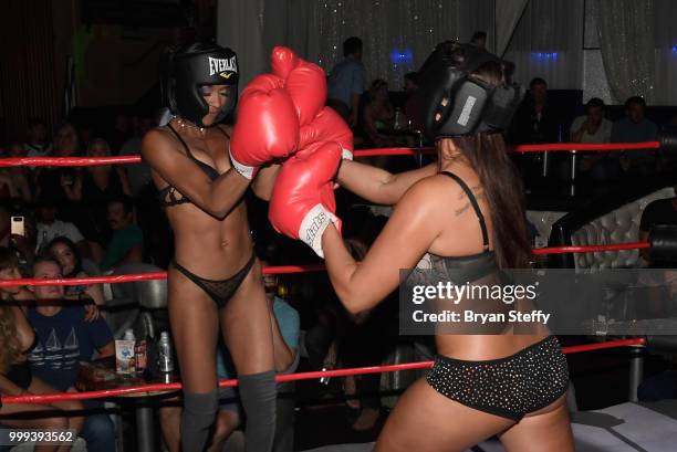 Contestants compete in "Foxy Boxing" during Larry Flynt's Hustler Club Instagram party hosted by Jessica Weaver at Larry Flynt's Hustler Club on July...