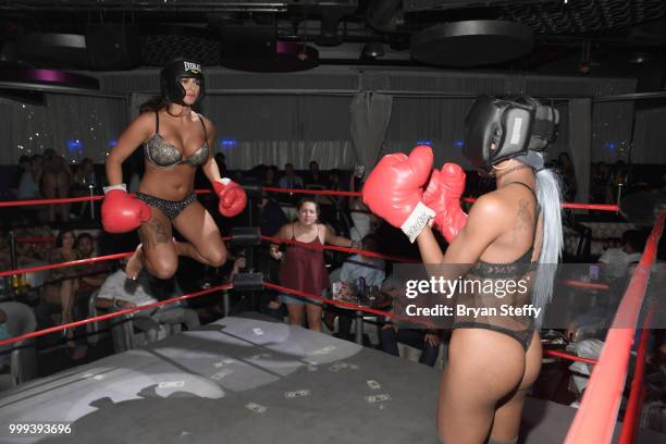 Contestants compete in "Foxy Boxing" during Larry Flynt's Hustler Club Instagram party hosted by Jessica Weaver at Larry Flynt's Hustler Club on July...