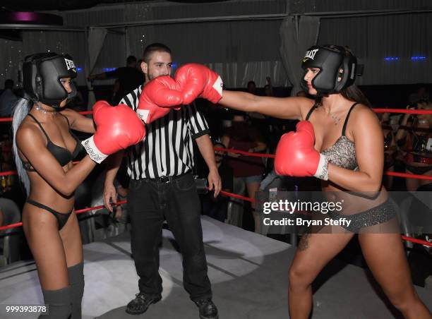 Contestants compete in "Foxy Boxing" during Larry Flynt's Hustler Club Instagram party hosted by Jessica Weaver at Larry Flynt's Hustler Club on July...