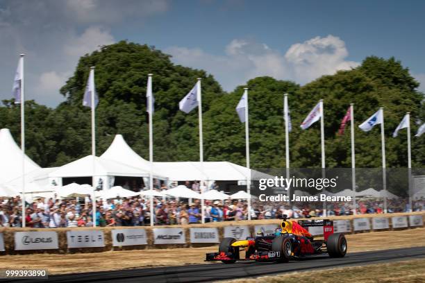 Patrick Friesacher of Austria drives the Red Bull Racing RB8 during the Goodwood Festival of Speed at Goodwood on July 14, 2018 in Chichester,...
