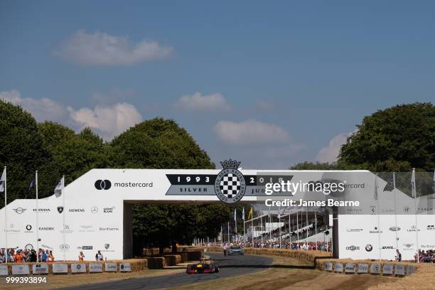 Patrick Friesacher of Austria drives the Red Bull Racing RB8 during the Goodwood Festival of Speed at Goodwood on July 14, 2018 in Chichester,...