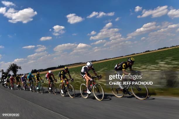 France's Jerome Cousin leads a ten-men breakaway during the ninth stage of the 105th edition of the Tour de France cycling race between Arras and...