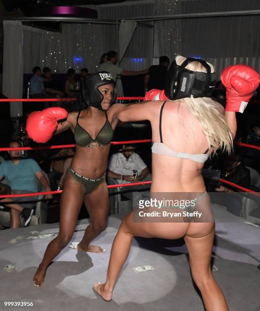 Contestants compete in "Foxy Boxing" during Larry Flynt's Hustler Club Instagram party hosted by Jessica Weaver at Larry Flynt's Hustler Club on July...