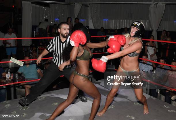 Contestants compete in "Foxy Boxing" during Larry Flynt's Hustler Club Instagram party hosted by Jessica Weaver at Larry Flynt's Hustler Club on July...