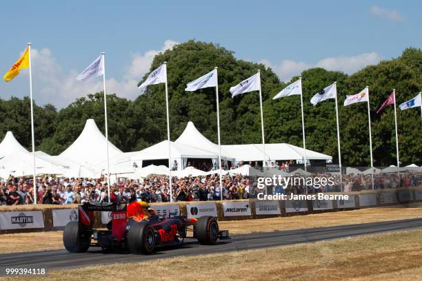 Patrick Friesacher of Austria drives the Red Bull Racing RB8 during the Goodwood Festival of Speed at Goodwood on July 14, 2018 in Chichester,...