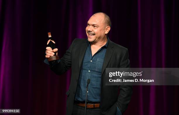 Stephen Page receives an award for Bangarra Dance Theatre for best regional touring production at the 18th Annual Helpmann Awards Curtain Raiser on...