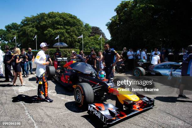 Patrick Friesacher of Austria prepares to drive the Red Bull Racing RB8 during the Goodwood Festival of Speed at Goodwood on July 14, 2018 in...