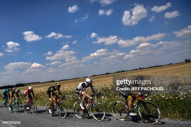 France's Jerome Cousin leads a ten-men breakaway during the ninth stage of the 105th edition of the Tour de France cycling race between Arras and...