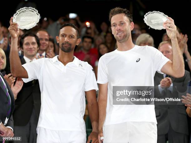 Mens Doubles Final - Raven Klaasen & Michael Venus v Mike Bryan & Jack Sock - Raven Klaasen and Michael Venus hold up second place trophies at All...