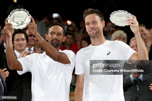 Mens Doubles Final - Raven Klaasen & Michael Venus v Mike Bryan & Jack Sock - Raven Klaasen and Michael Venus hold up second place trophies at All...