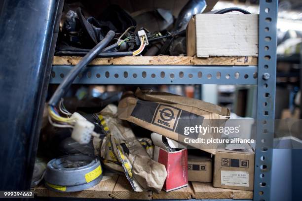 Opel spare parts lie in a hall owend by the Degener brothers in Vreden, Germany, 06 July 2017. The brothers have been collecting Opel vintage cars...