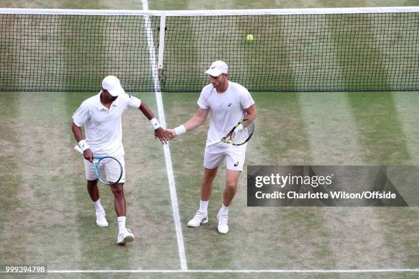 Mens Doubles Final - Raven Klaasen & Michael Venus v Mike Bryan & Jack Sock - Raven Klaasen and Michael Venus hi-five at All England Lawn Tennis and...