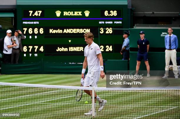 Kevin Anderson of South Africa celebrates after beating John Isner of the United States in the semi final of the gentlemen's singles at the All...