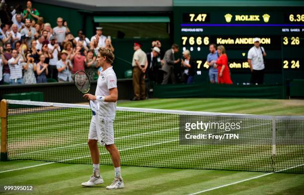 Kevin Anderson of South Africa celebrates after beating John Isner of the United States in the semi final of the gentlemen's singles at the All...