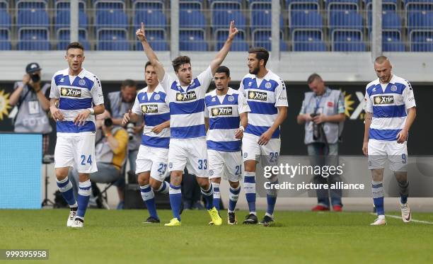 Duisburg's Moritz Stoppelkamp celebrates the 1:0 lead for his team during the German 2nd Bundesliga soccer match between MSV Duisburg and Darmstadt...