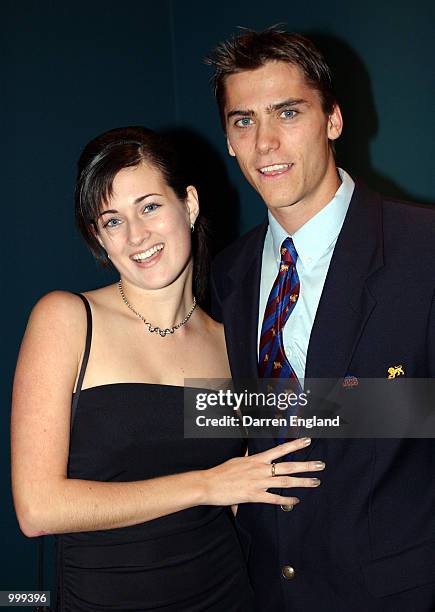 Simon Black of the Brisbane Lions and his partner Catherine Chappell arrive for the AFL Brownlow Medal presentation at the Gabba in Brisbane,...