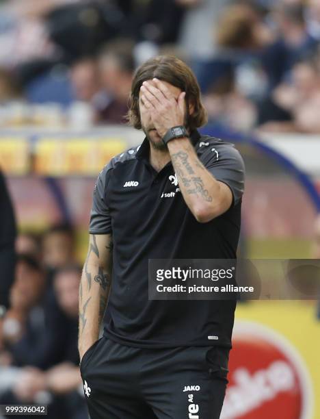 Darmstadt's coach Torsten Frings gives instructions during the German 2nd Bundesliga soccer match between MSV Duisburg and Darmstadt 98 in the...