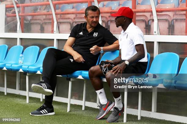 Fulham Manager Slavisa Jokanovic chats to Jean-Michael Seri ahead of the pre-season friendly between Reading and Fulham at the EBB Stadium on July...