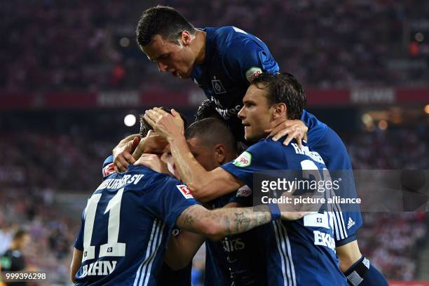 Hamburg's team celebrates Andre Hahn's goal during the German Bundesliga soccer match between 1. FC Cologne and Hamburger SV in the...