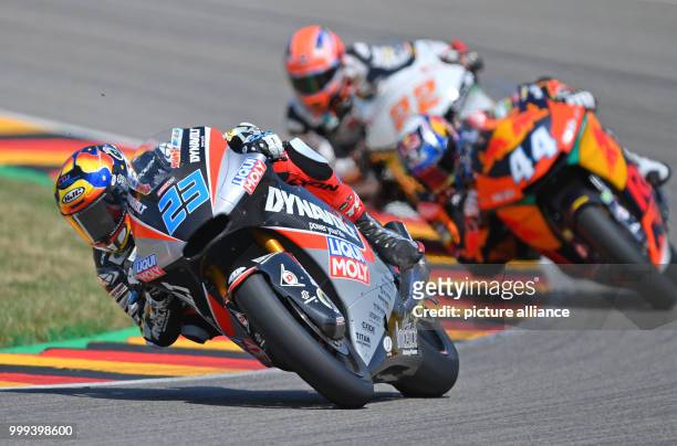 July 2017, Germany, Hohenstein-Ernstthal: German motorcycle Grand Prix, Moto2 at the Sachsenring: Marcel Schroetter ahead of Miguel Oliveira and Sam...