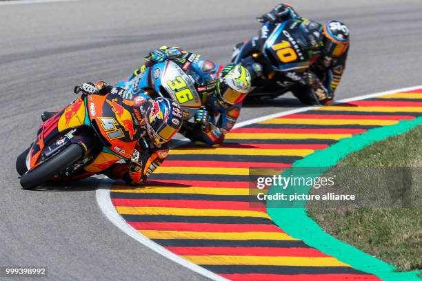 July 2017, Germany, Hohenstein-Ernstthal: German motorcycle Grand Prix, Moto2 at the Sachsenring: Brad Binder leads ahead of Joan Mir and Luca Marini...