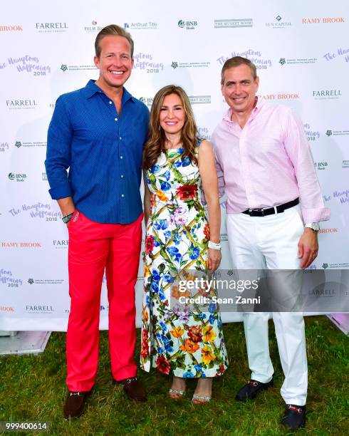 Chris Wragge, Maria Fishel and Kenneth Fishel attend The Samuel Waxman Cancer Research Foundation 14th Annual The Hamptons Happening on July 14, 2018...