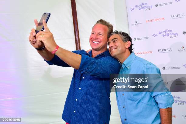 Chris Wragge and Michael Nierenberg attend The Samuel Waxman Cancer Research Foundation 14th Annual The Hamptons Happening on July 14, 2018 in...