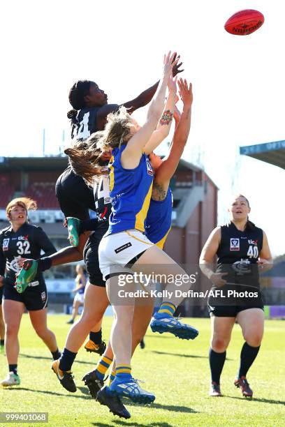 Akec Chuot of the Blues marks the ball during the round 10 VFLW match between Carlton Blues and Williamstown Seagulls at Ikon Park on July 15, 2018...