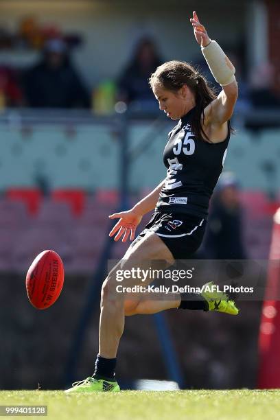 Chloe Dalton of the Blues kicks the ball during the round 10 VFLW match between Carlton Blues and Williamstown Seagulls at Ikon Park on July 15, 2018...