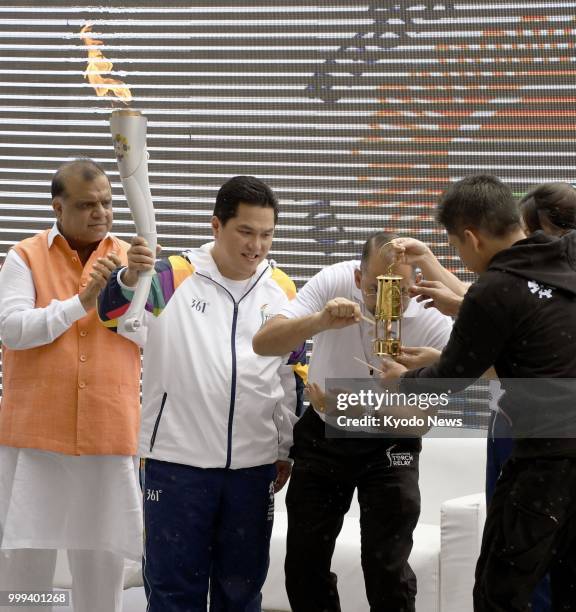 The torch for the 18th Asian Games to be held in August in Indonesia is lit at Major Dhyan Chand National Stadium in New Delhi, the site of the first...