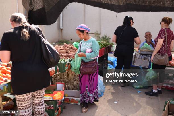 July 15, 2018: Israelis at the local market in the Southern city of Sderot, located near the Israel-Gaze border as a cease-fire holds after day of...