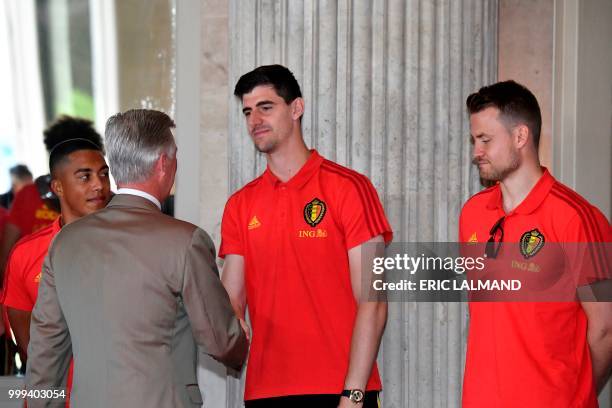 King Philippe - Filip of Belgium congratulates Belgium's team players midfielder Youri Tielemans, Belgium's goalkeeper Thibaut Courtois and...