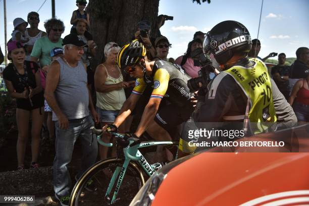 Netherlands' Dylan Groenewegen gets going again after crashing during the ninth stage of the 105th edition of the Tour de France cycling race between...