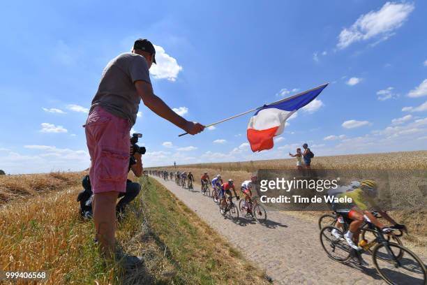 Greg Van Avermaet of Belgium and BMC Racing Team Yellow Leader Jersey / Peloton / Cobbles / Pave / Fans / Public / French flag / Landscape / during...